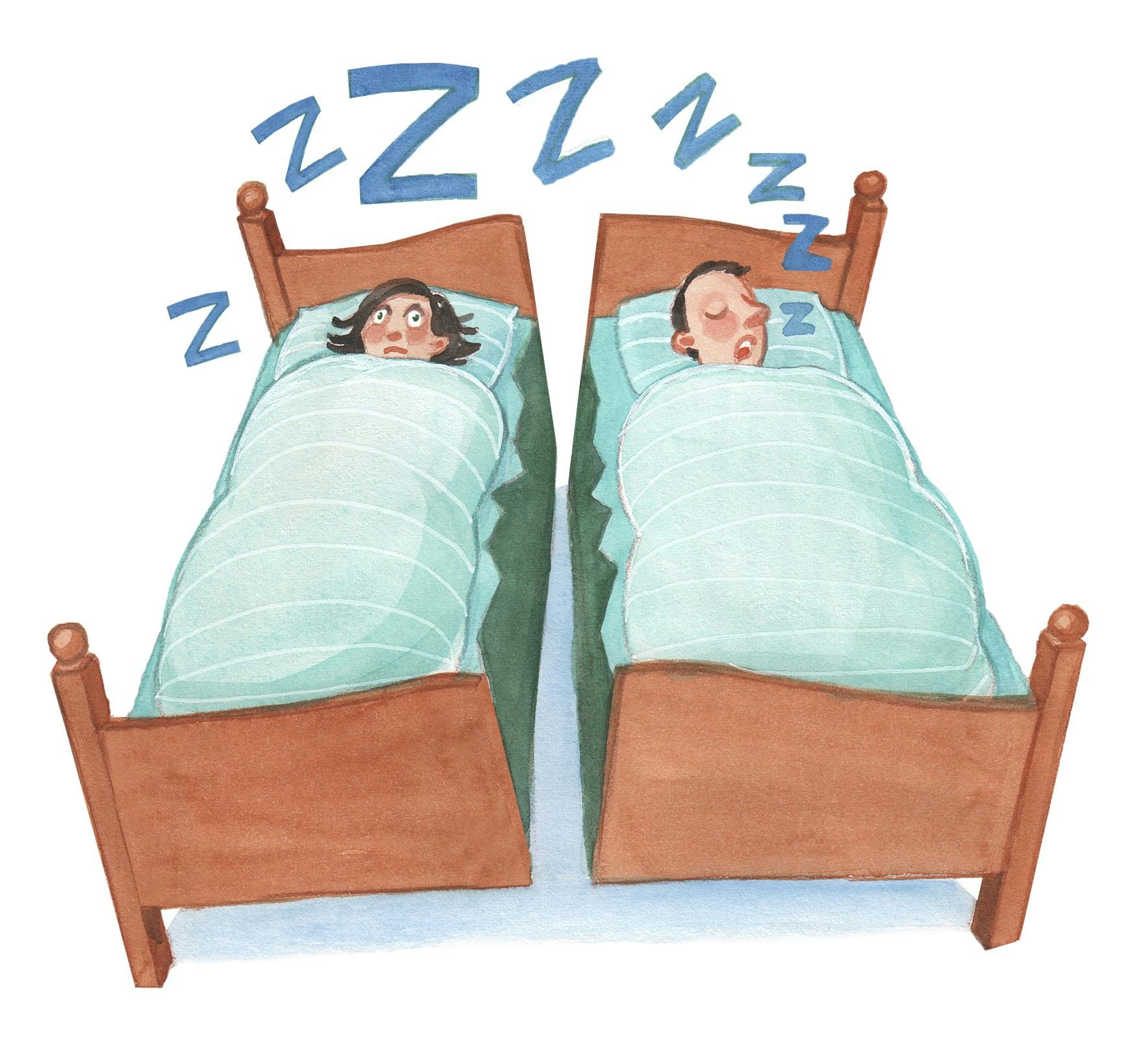 Kvinde og mand der sover i en seng