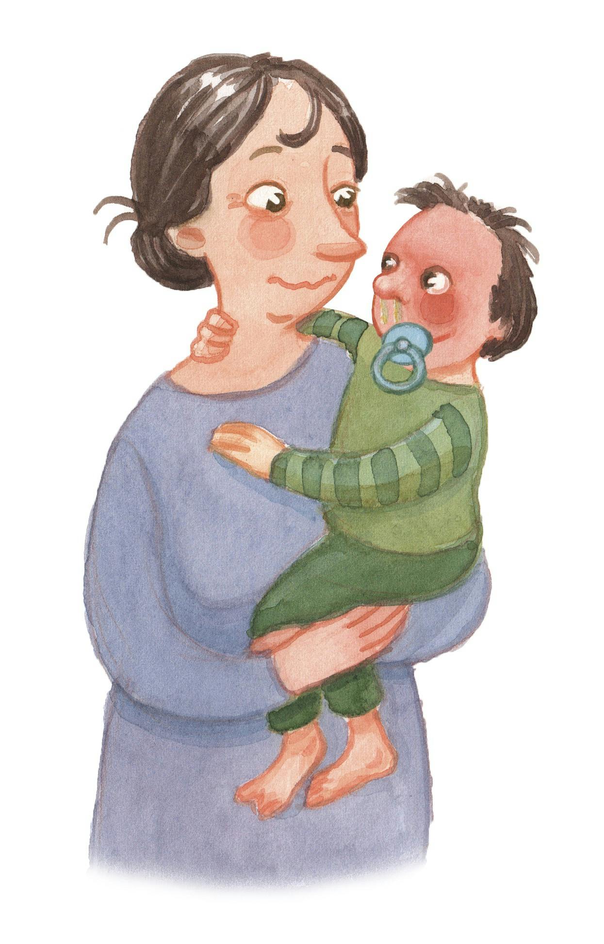 Kvinde holder en baby