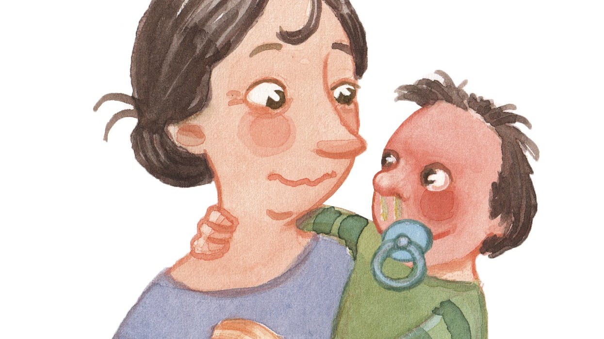 Kvinde holder en baby