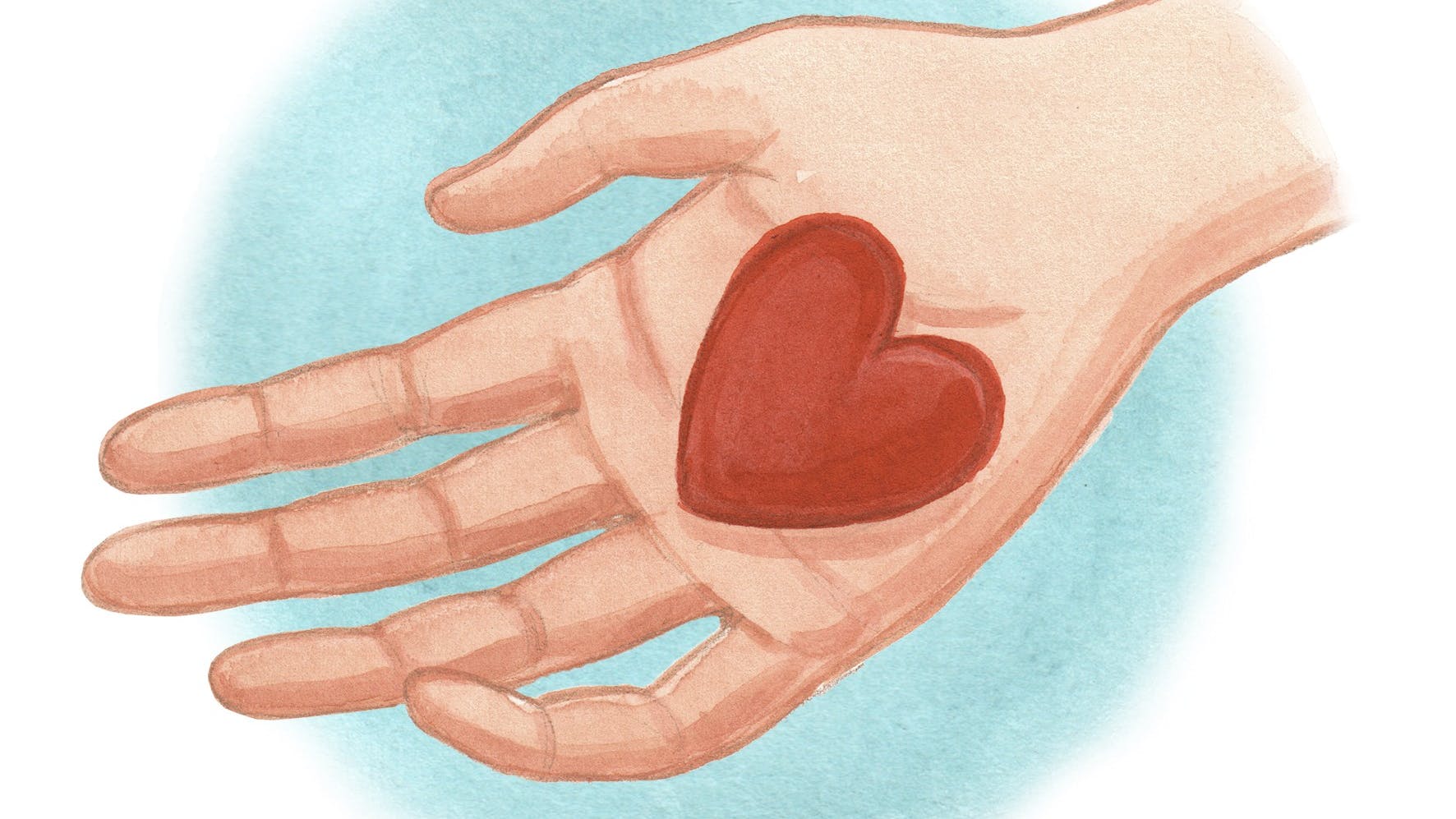 En hånd, der holder et hjerte 