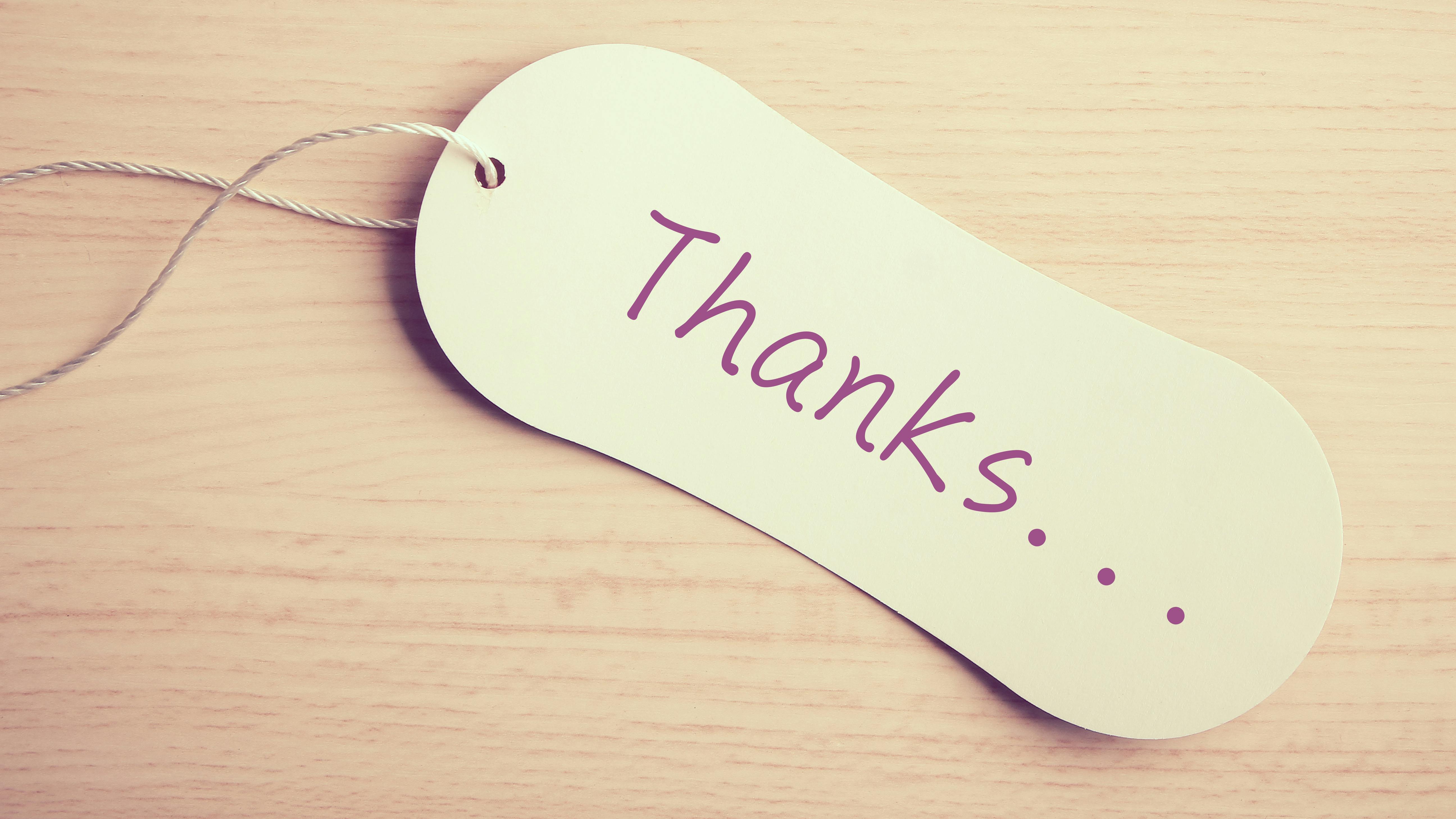 Lille skilt, hvor der står tak på