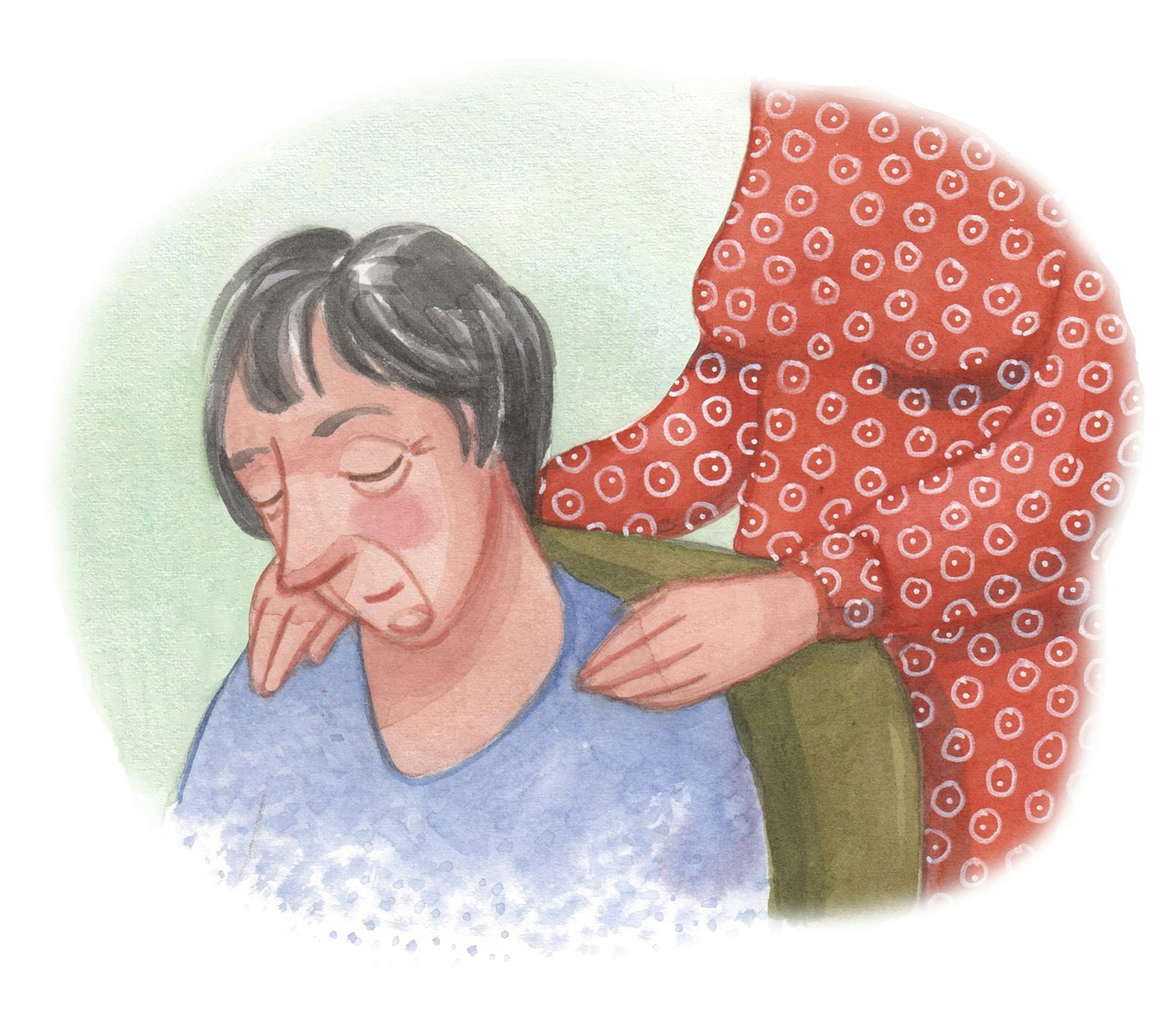 En ældre kvinde ser trist ud