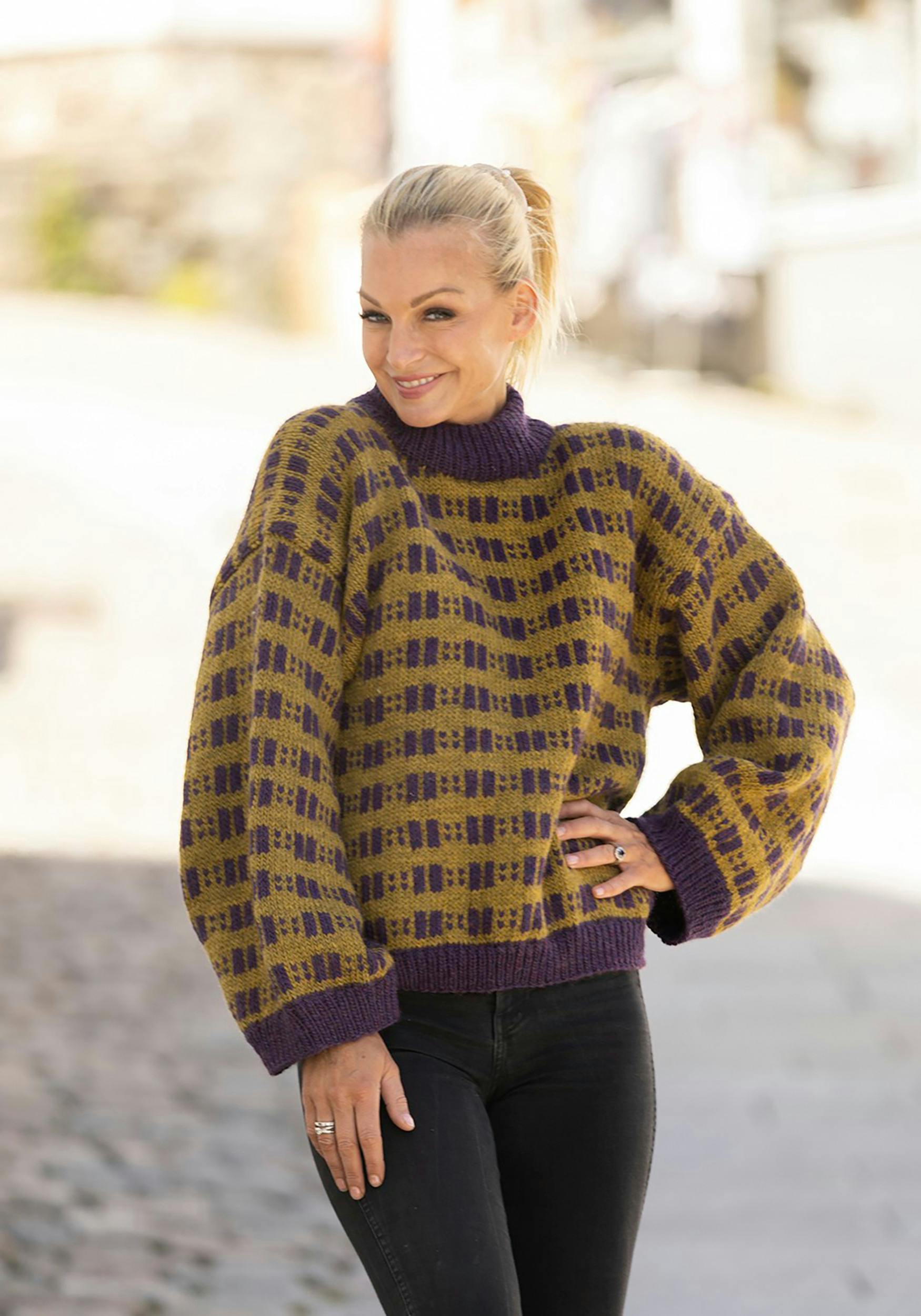 Sweater med tilsatte ærmer