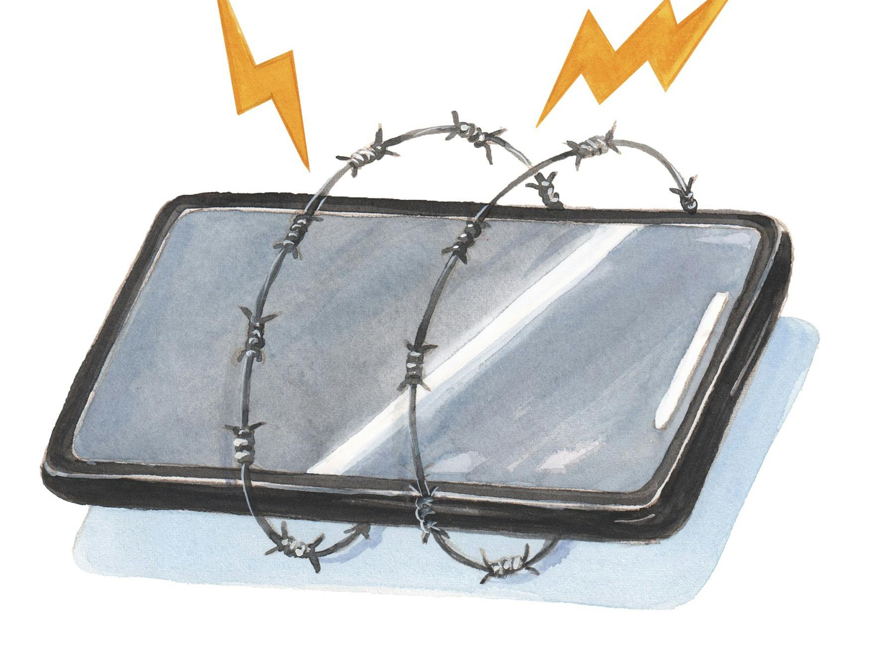 En mobiltelefon, der er omringet af tråd