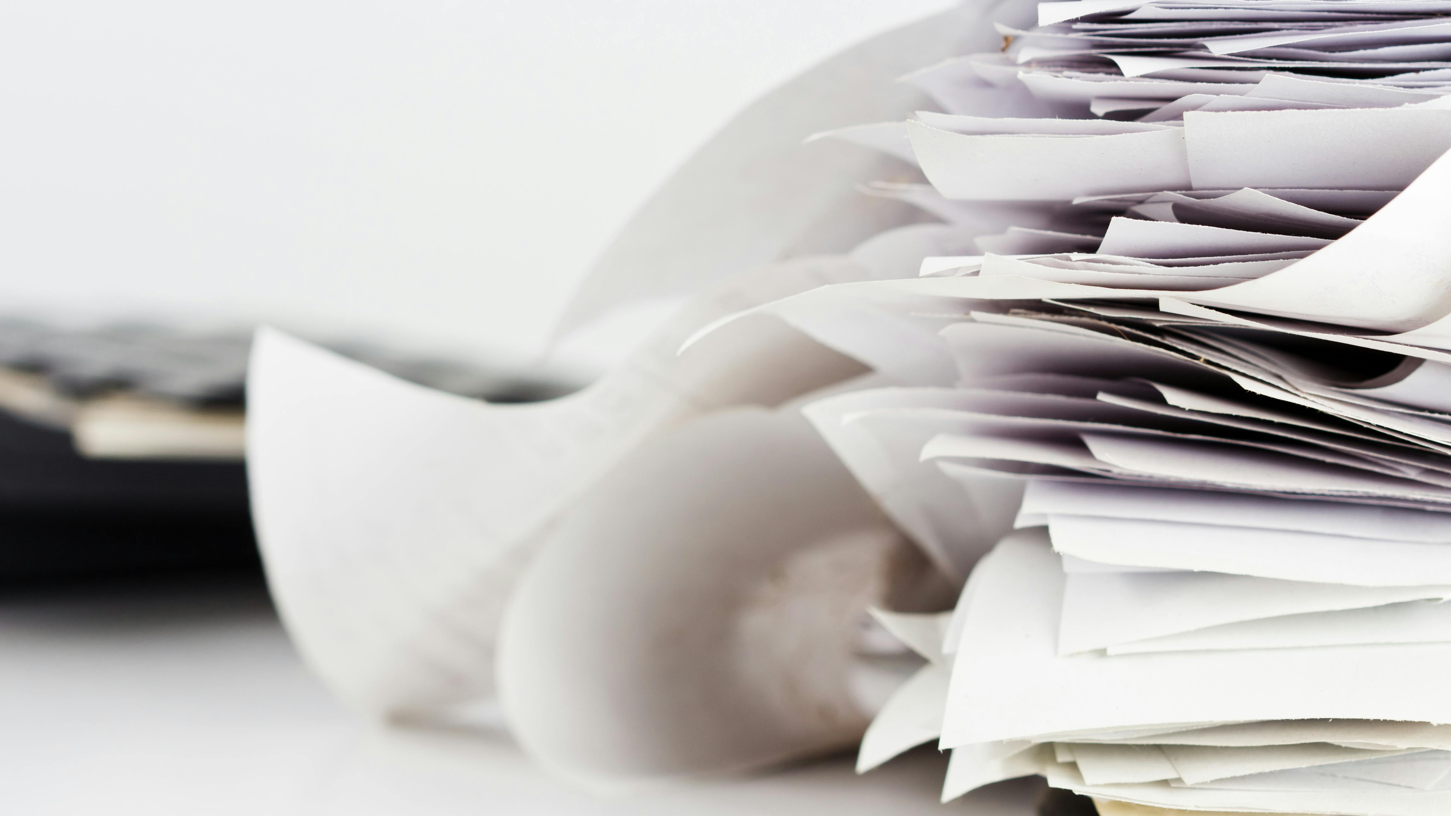 Stack of reciept bills on business desk