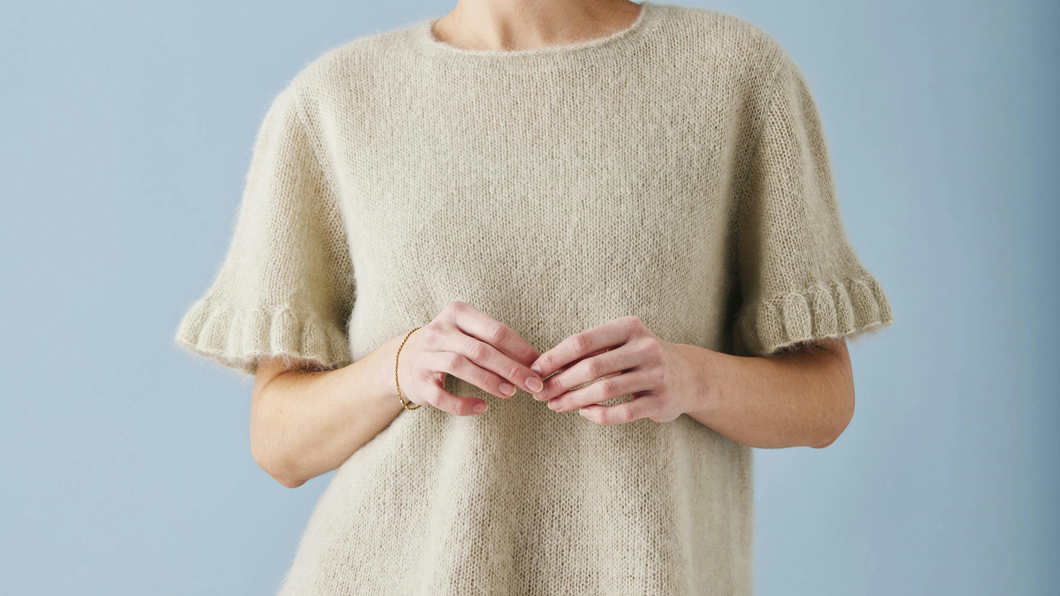 Bluse med flænsekanter