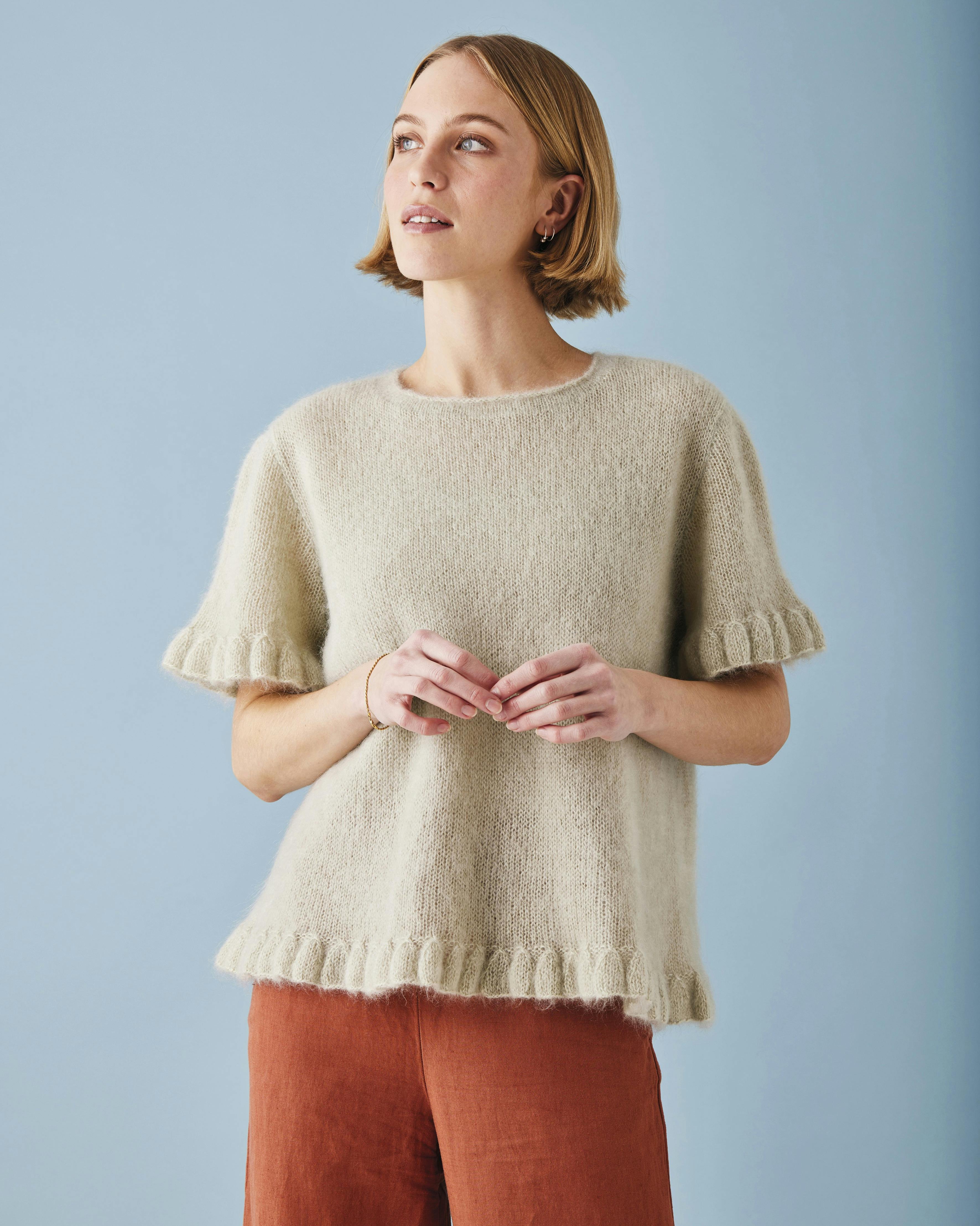 Bluse med flænsekanter