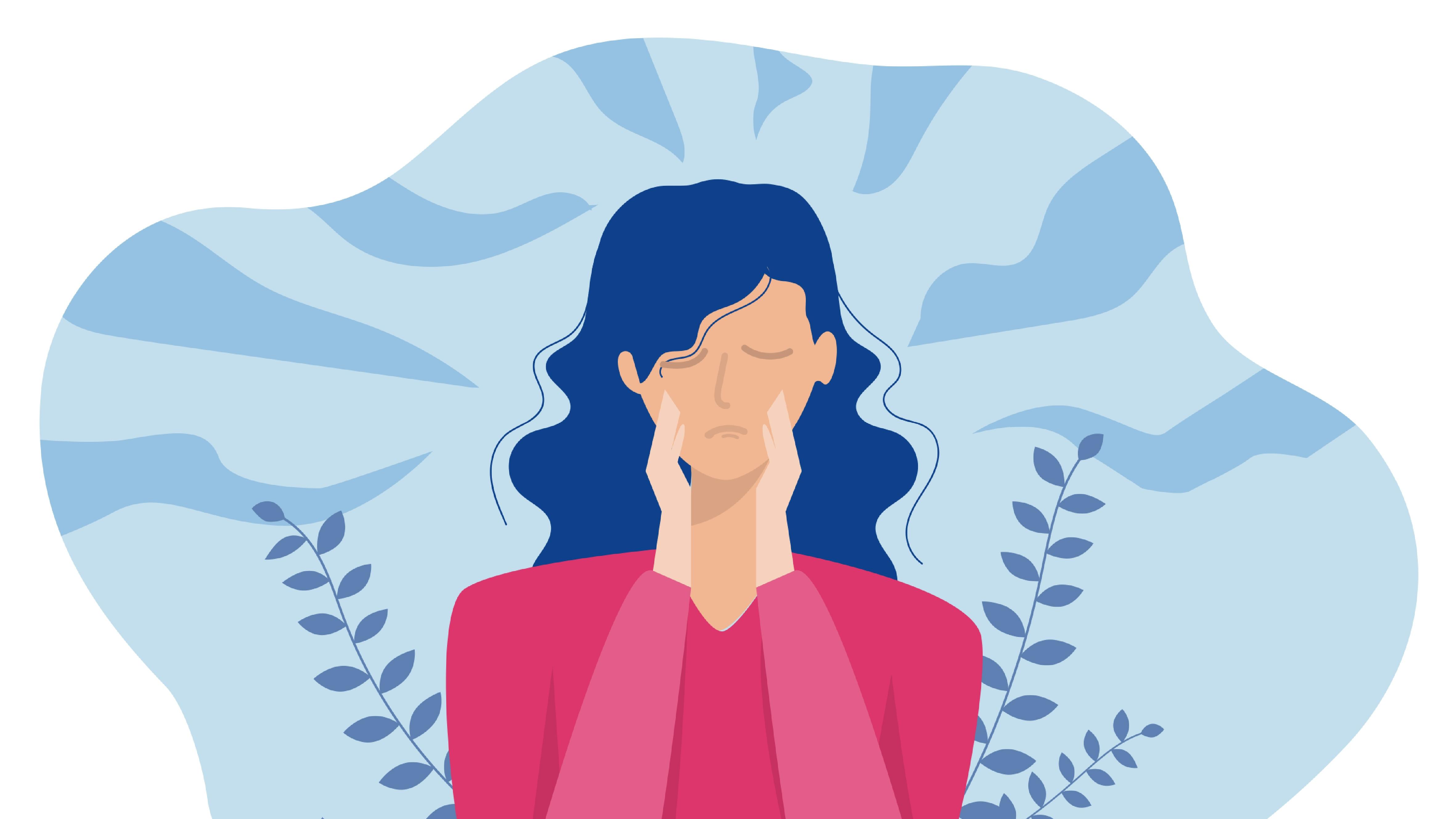 En kvinde der tager sig til hovedet