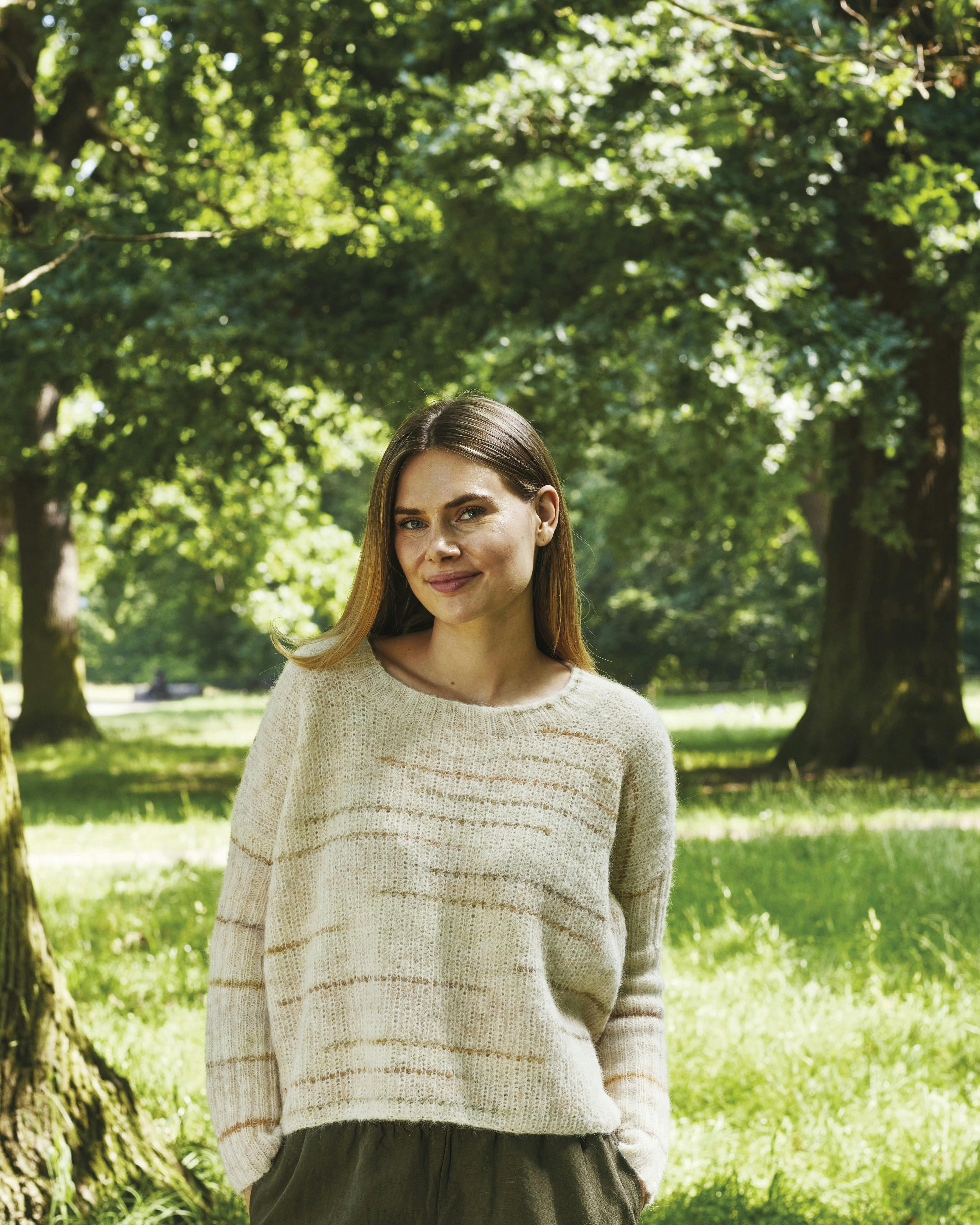 Patentbluse med ribærmer