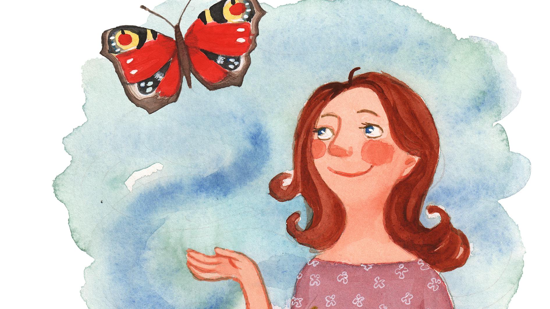 Kvinde kigger på sommerfugl