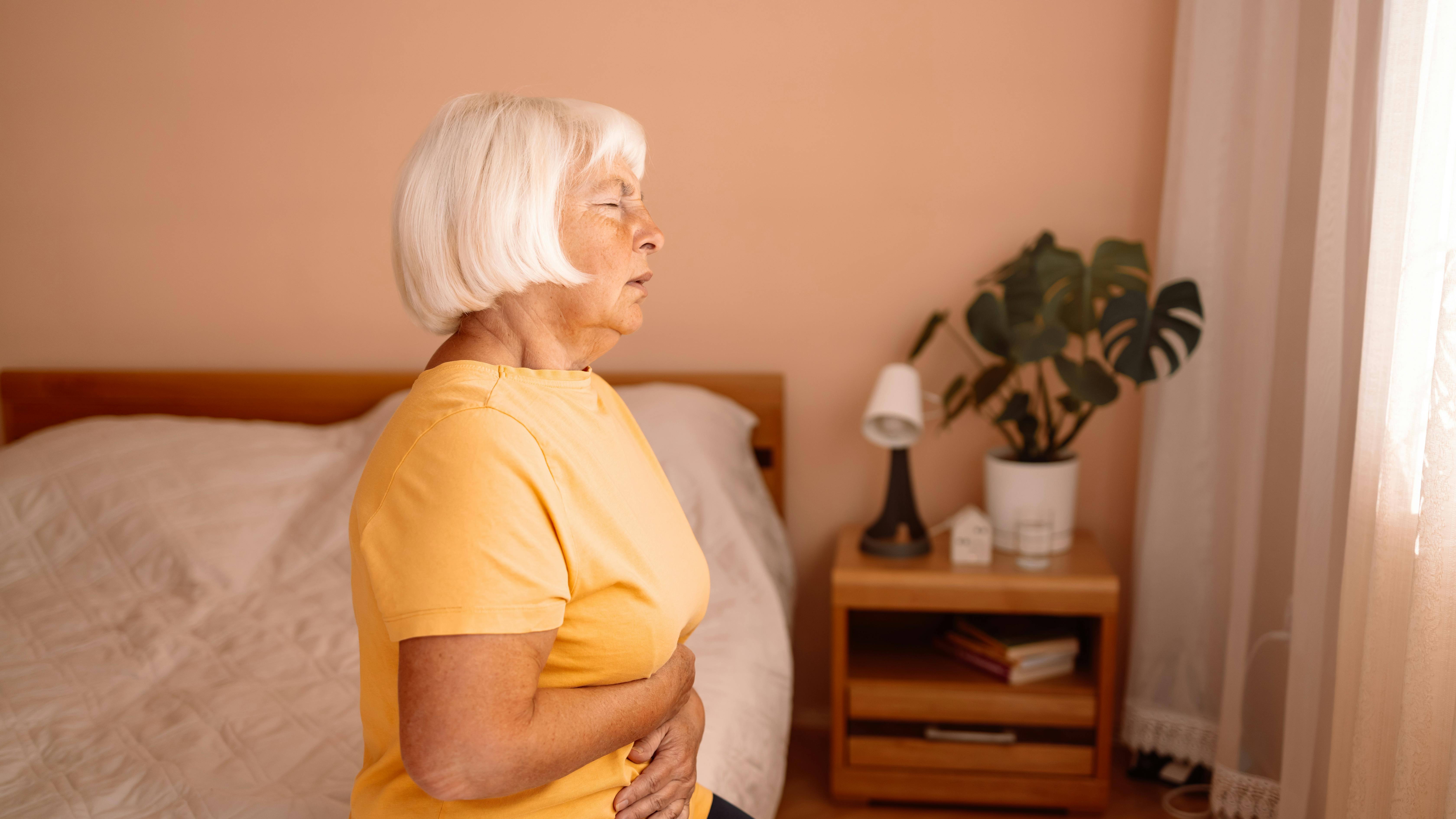 Kvinde med mavesmerter