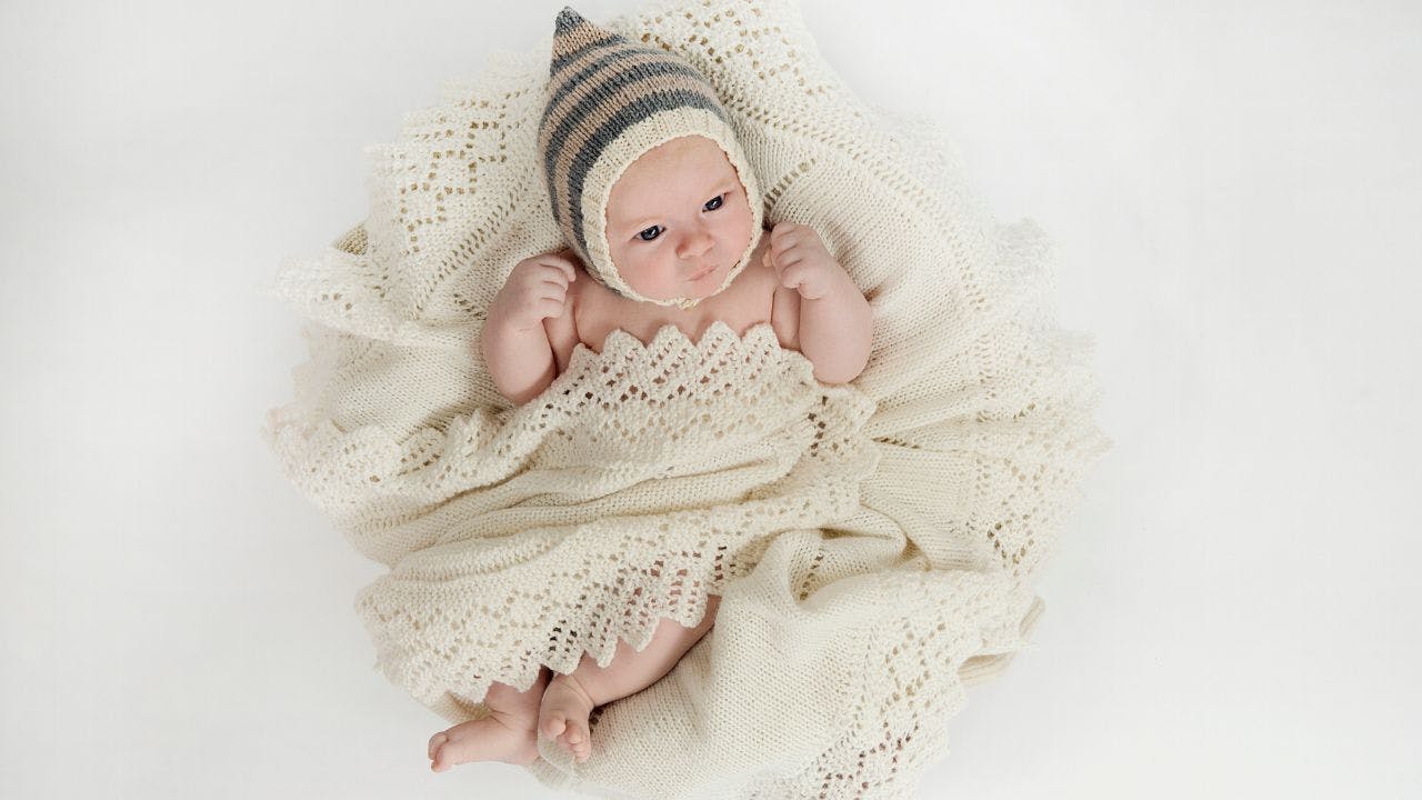 Strik et smukt rundt babytæppe