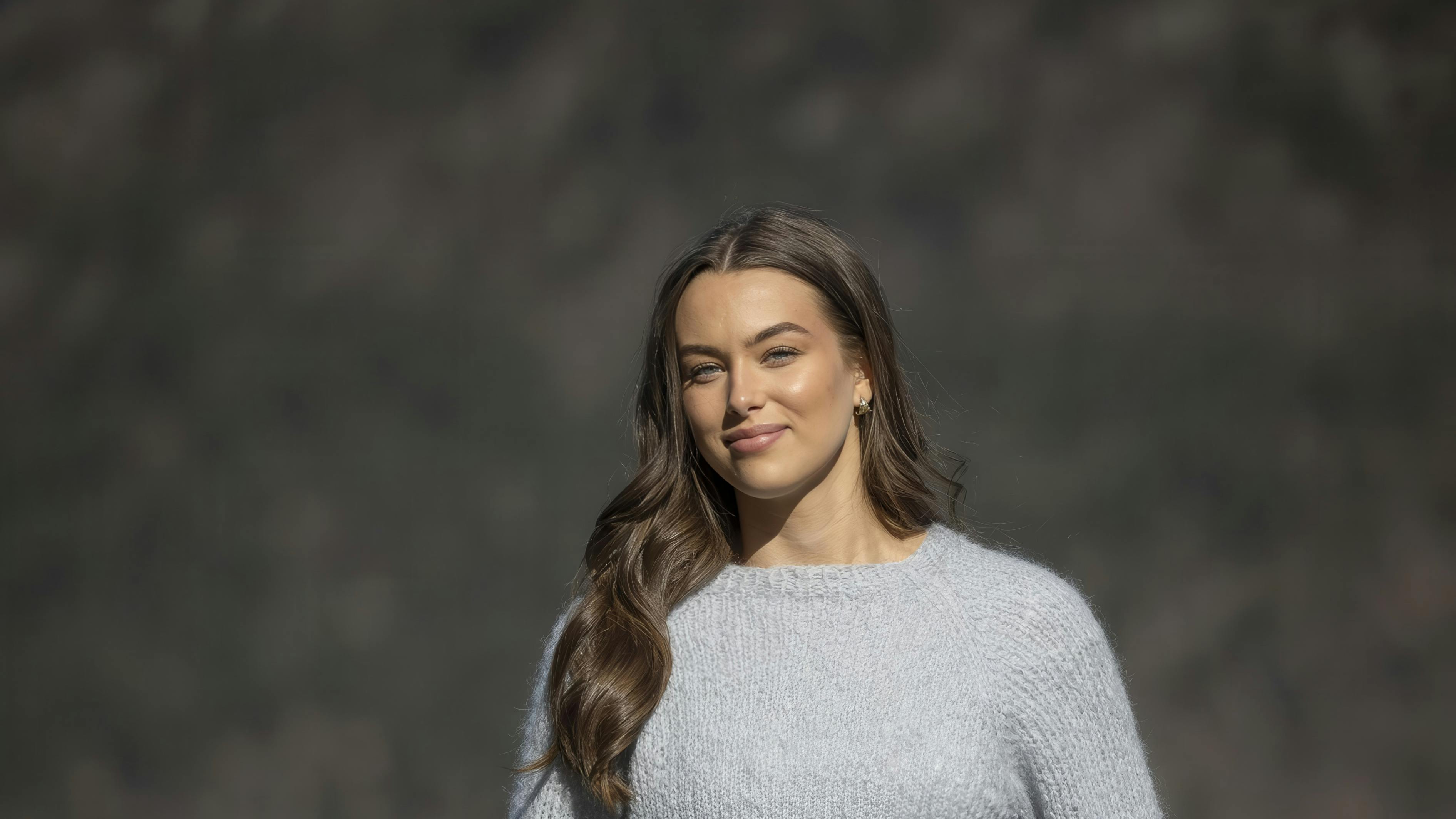 Strikbluse med krydsmønster