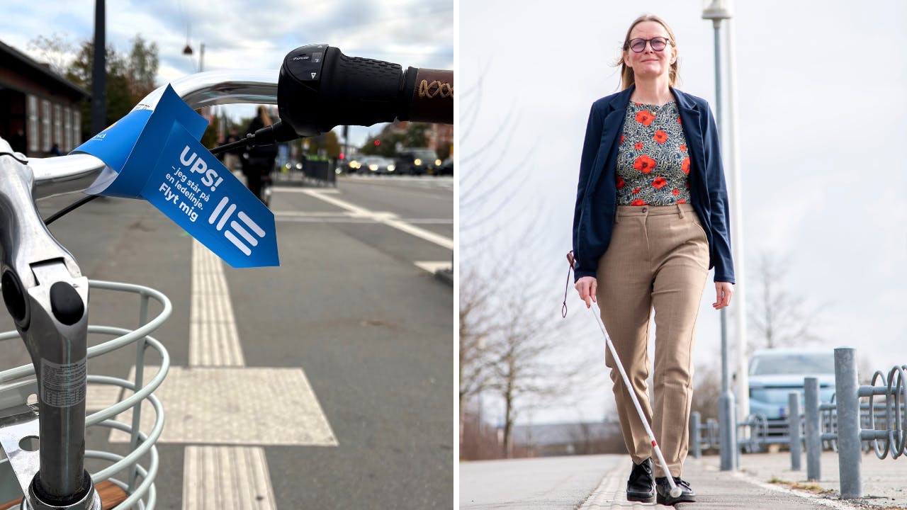 Diana Stentoft med blindestok på ledelinje og cykel med blåt mærkat på styret