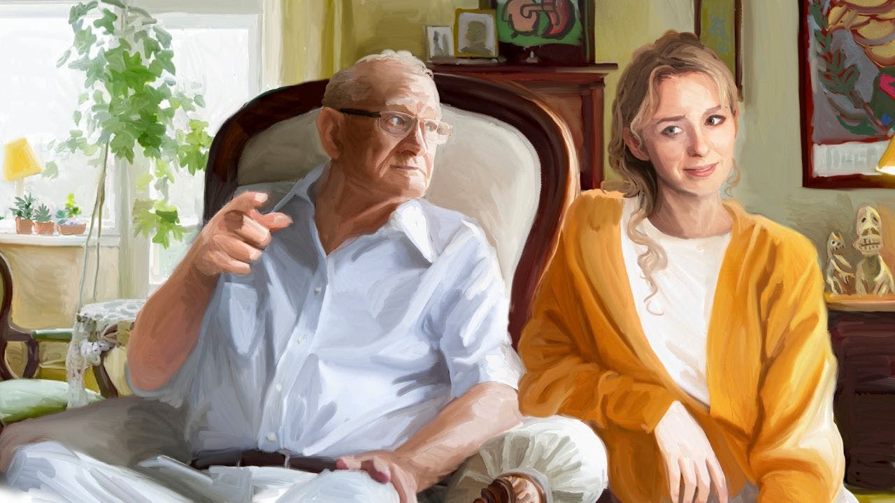 Ældre mand sidder i lænestol og peger ved siden af ung kvinde, som sidder lænet op ad armlænet