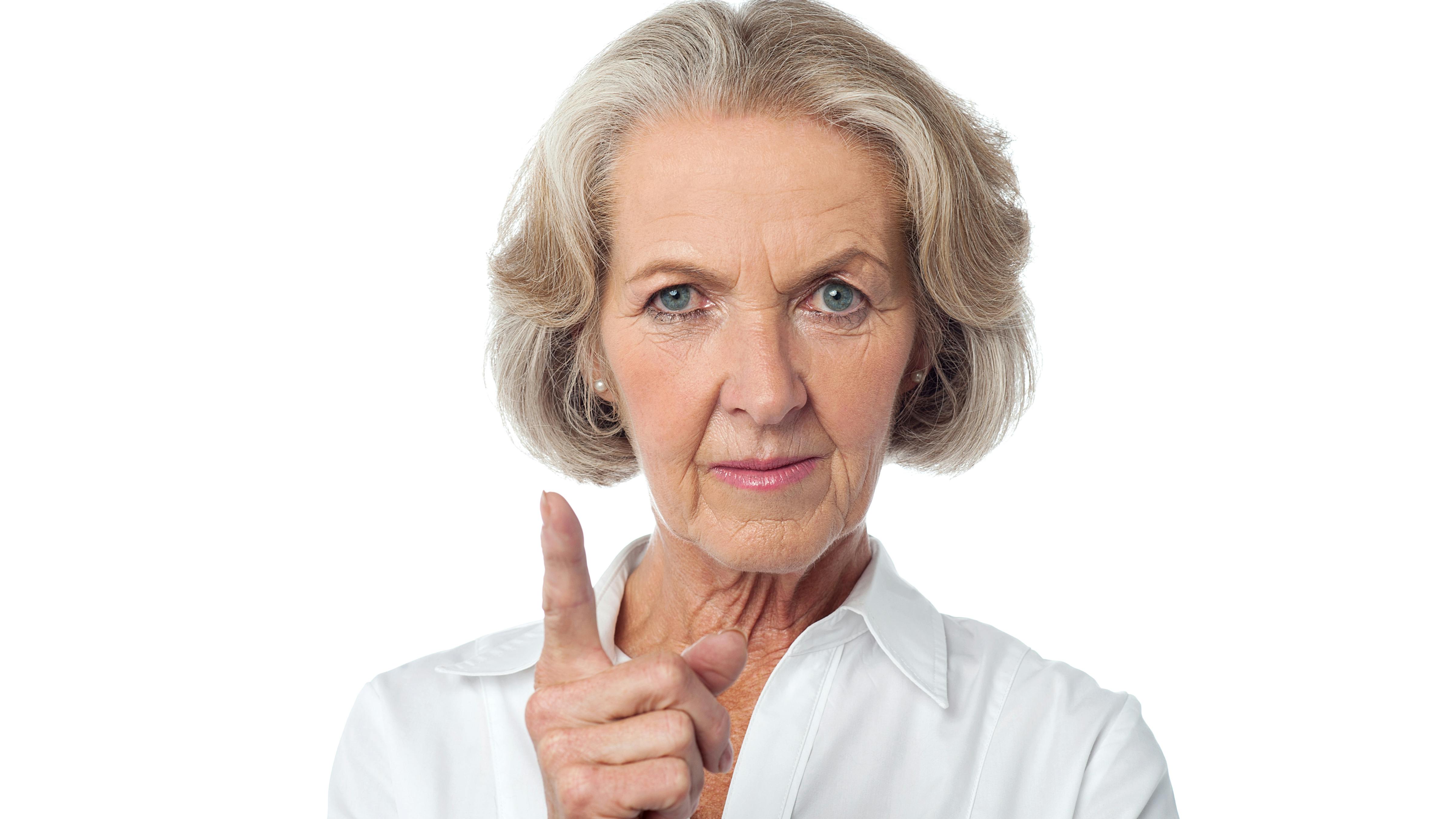 Vred kvinde med løftet pegefinger