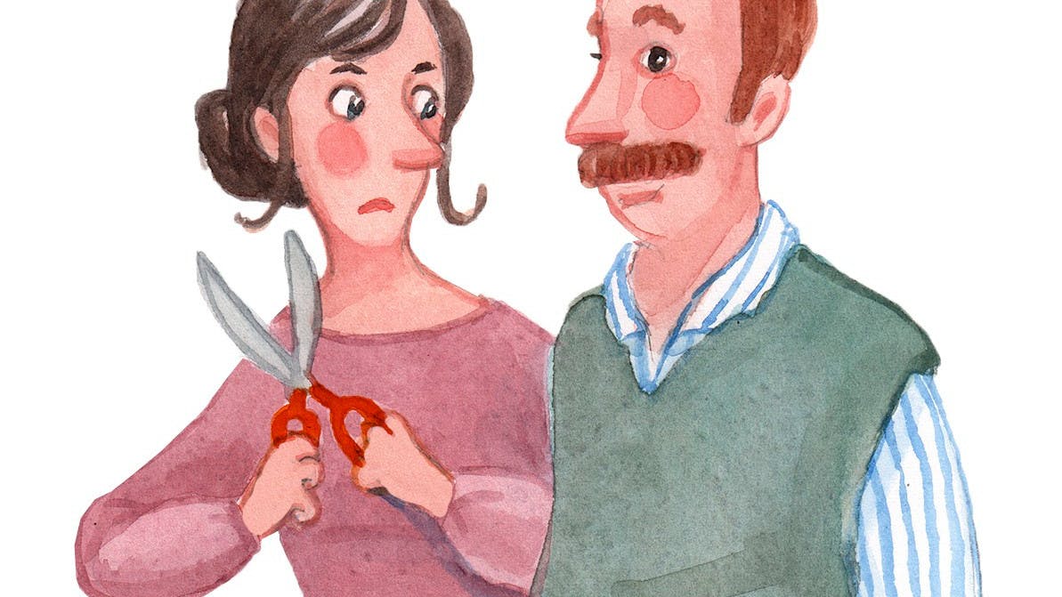 kvinde med saks står ved siden af mand med overskæg