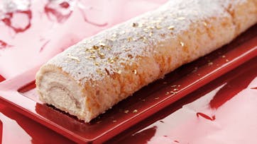 Hvid juleroulade alla kransekage med hvid chokoladecreme