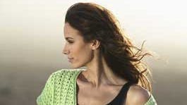 En top, der luner lidt over skuldrene