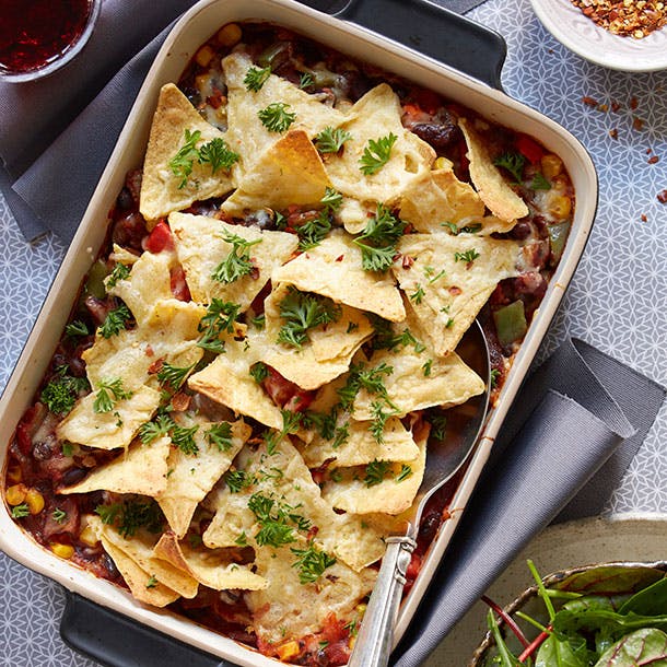https://imgix.familiejournal.dk/media/article/baked-beans-med-tortilla.jpg