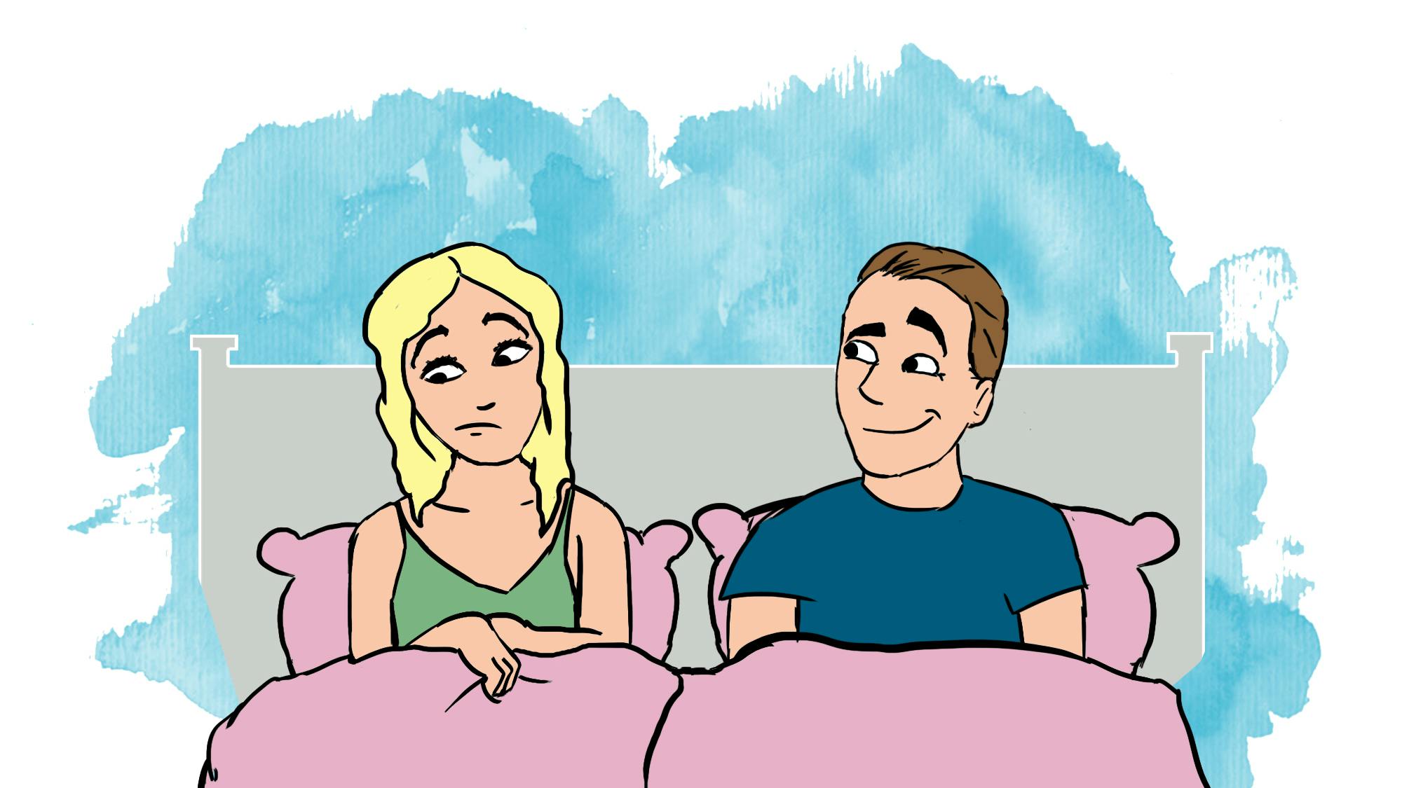 Mand og kvinde ligger i en seng