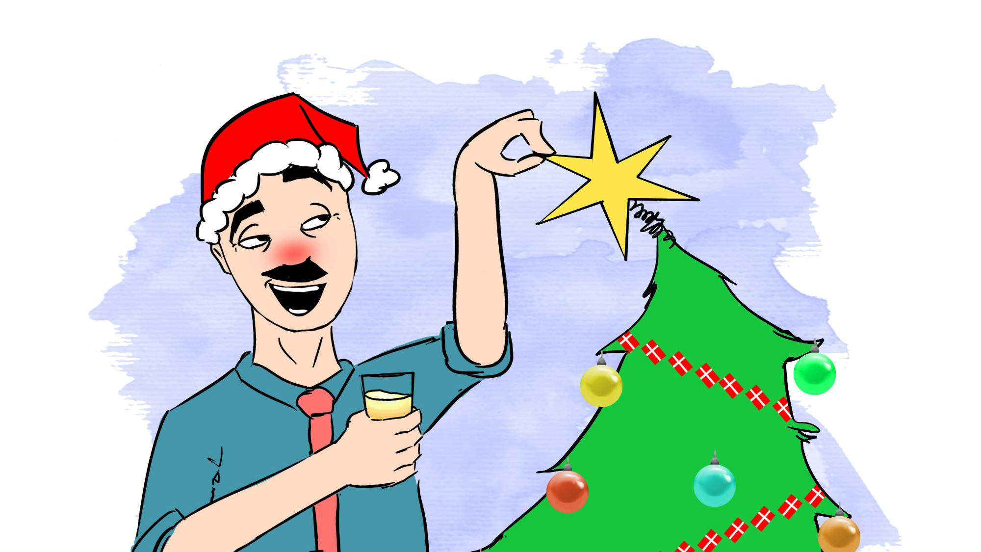 Mand pynter juletræ