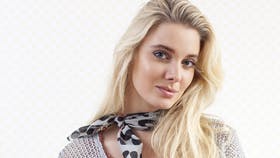 Strikket ponchobluse